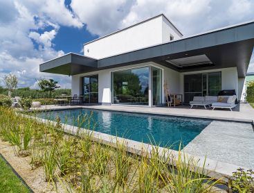 A living pool in a modern design to match the house